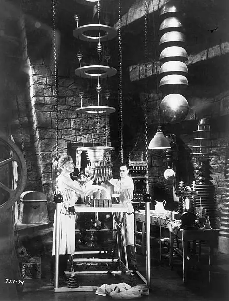 Electrical coils and glass instruments in a vintage laboratory.